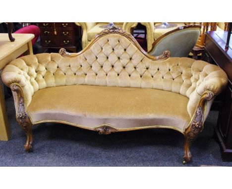 A Victorian chaise, cresting top rail, button upholstery