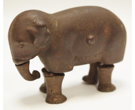 Late 19th Century cast iron walking elephant toy, marked patent 1873, made by the Ives Toy Company of Bridgeport Connecticut,