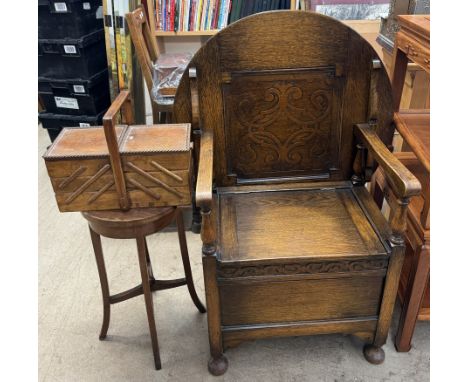 An oak Monks seat with a circular hinged top above a box sear on turned legs together with an occasional table, a small tripo