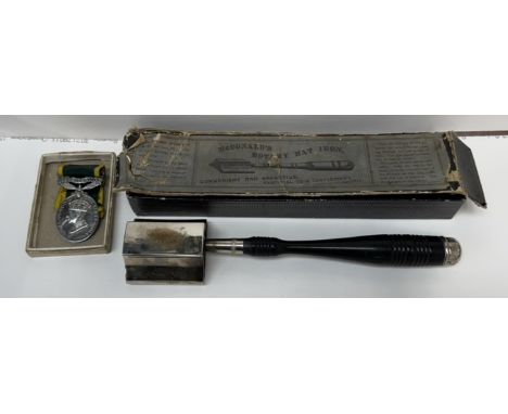 A Territorial medal issued to 2069133 Sjt T M Bothwell R E together with a McDonald's rotary hat iron, boxed 