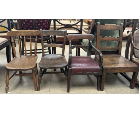 A 19th century mahogany child's elbow chair with a pad seat on splayed legs together with ladder back child's chair and two 1