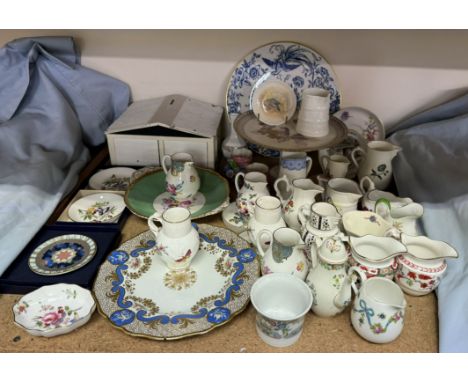 A collection of Royal Worcester miniature jugs together with a Royal Worcester pin tray painted with a Wood Pigeon, decorativ