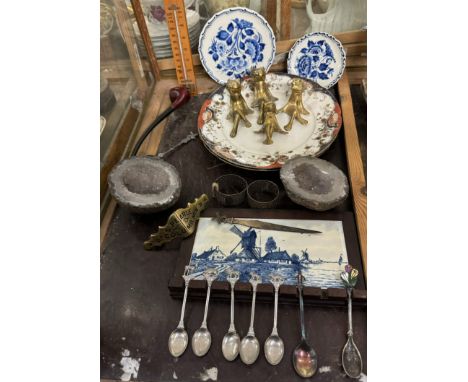 Two geodes together brass seated figures, souvenir spoons, pipe other brasswares etc 