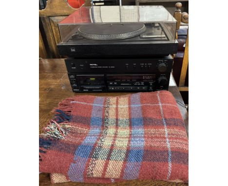 A Denon tape deck together with a Rotel amplifier, a turntable and a blanket 