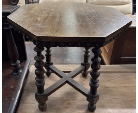 A small hexagonal occasional table on bobbin turned legs and turned feet 