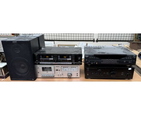 An Aiwa Stereo integrated amplifier XA-003 together with a Grundig RCD 45 twin deck CD player, A Technics double tape deck, a