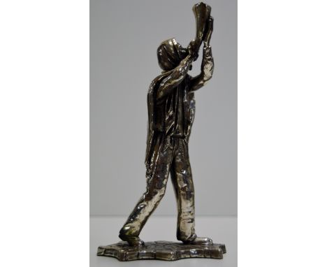 8¼" CONTINENTAL WHITE METAL FIGURE MODELLED AS A MAN PLAYING A BUGLE - SIGNED C. TAWF     