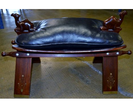 BRASS INLAID SADDLE STOOL WITH HANDLES MODELLED AS CAMELS & LEATHER SEAT     