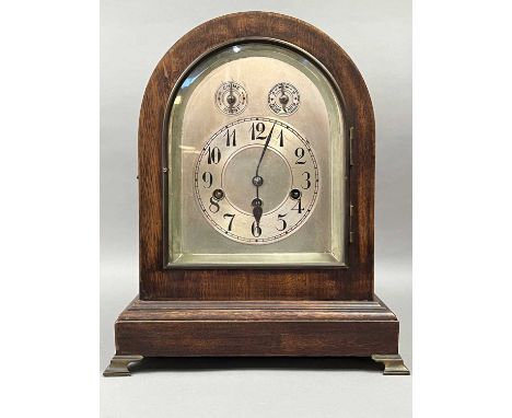 LATE 19TH CENTURY OAK MANTEL CLOCK,with three train eight day movement, by Junghans, the silvered dial set with Arabic numera