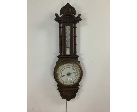VICTORIAN CARVED OAK BAROMETER,86cm highBarometer appears to be in working order, the thermometer is not accurate.