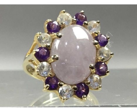 LAVENDER JADE RING,within a gem set halo, in fourteen carat gold, size N