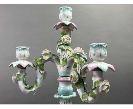 CONTINENTAL PORCELAIN CANDLEABRUM,52cm high, along with eleven ceramic figures (12)