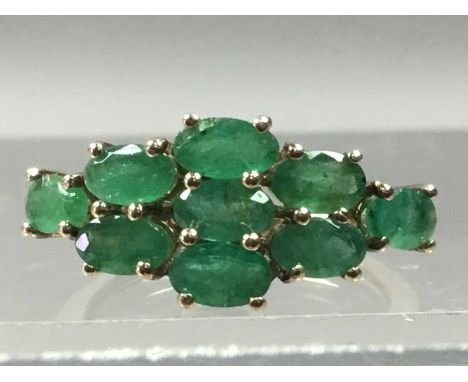 EMERALD DRESS RING,in nine carat gold, size N