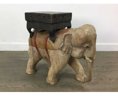 HARDWOOD PLANT STAND,modelled with an elephant base, 46cm high