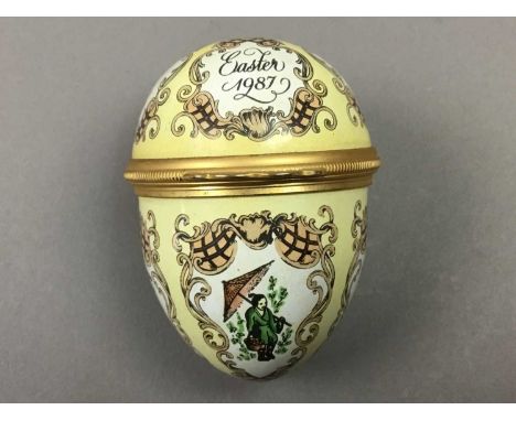 TWO HALCYON DAYS EASTER EGG TRINKET BOXES,for 1987 and 1998, each 6cm high, along with a ceramic trinket box of Worcester des