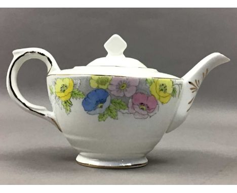 TAYLOR &amp; KENT FLORAL DECORATED TEA FOR TWO SERVICE,comprising a tea pot, two cups and saucers and a plate, along with a 2