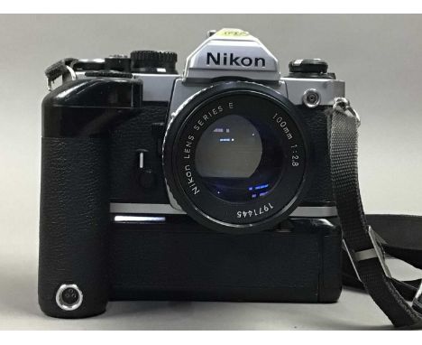 NIKON FM2 CAMERA,with Nikon series E 100mm 1:2.8 and 50mm 1:1.8 lenses, also a Cobra tripodThe shutter works inconsistently o