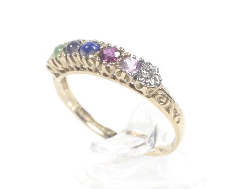 A vintage 9ct gold acrostic 'DARLING' ring. Set with a Diamond, Amethyst, Ruby, Lapis lazuli, Iolite, Nephrite and Garnet, on