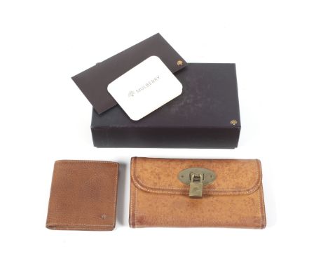 A Mulberry natural grain tan leather wallet and purse. The wallet featuring eleven card slots, a bill pocket and a photograph