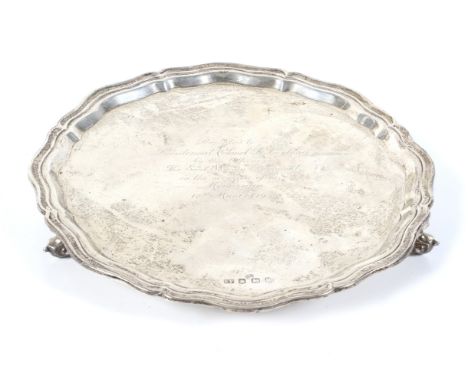 A silver shaped round salver. Engraved with a Regimental marriage presentation inscription to Lieutenant Colonel R Leyland by