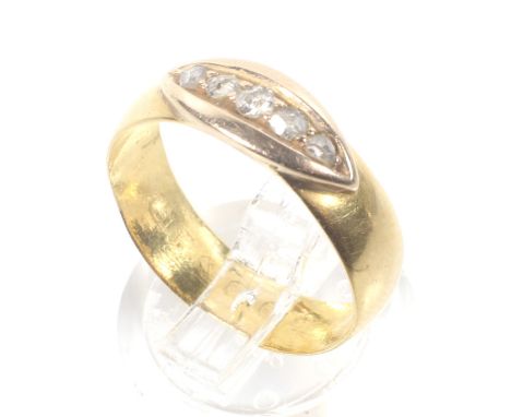 A Victorian 22ct gold wedding band later adapted as a rose diamond five stone ring. The head set with five graduated rose dia