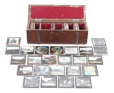 A collection of 20th century glass projector slides. Featuring the British Royal Family, coloured nativity scenes, historical