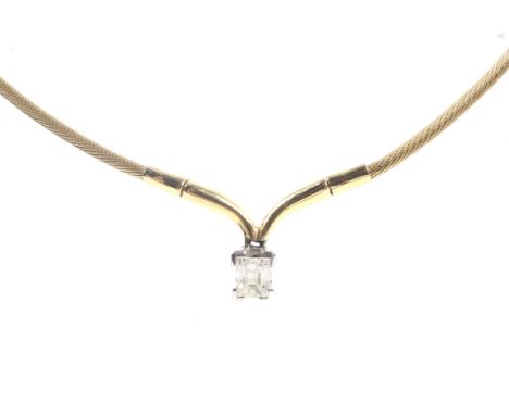 A modern 18ct gold and diamond pendant necklace. The millennium-cut diamond, claw set on a cable link necklace to a bolt ring