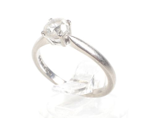 An 18ct white gold and diamond solitaire ring, approx. 0.63cts (thick and facetted girdle)