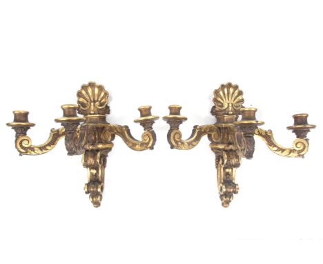 A pair of 18th century carved wooden 'Chippendale' three-branch wall brackets. With parcel gilt, finish and carved  acanthus,