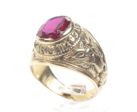 A vintage American gold and synthetic-ruby 'United States Army' college style ring. The oval mixed-cut synthetic-ruby, rub-ov