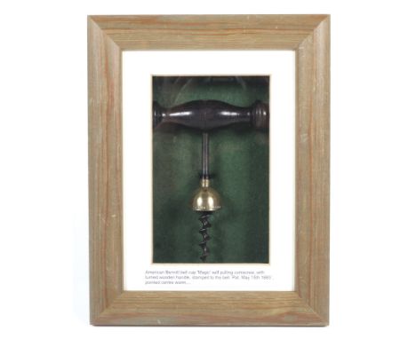 William Bennitt 'Magic' corkscrew framed ,an American Bell cap self pulling corkscrew with turned wooden handle with acorn sh