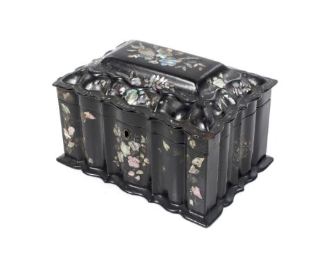 A Victorian black lacquered papier mache two sectional tea caddy. Of serpentine form with abalone shell and mother of pearl i