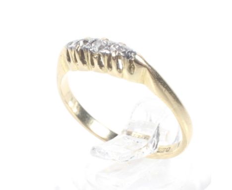 A vintage 18ct gold and diamond five stone ring, The graduated eight-cut stones claw set on a D-section shank with hallmarks 