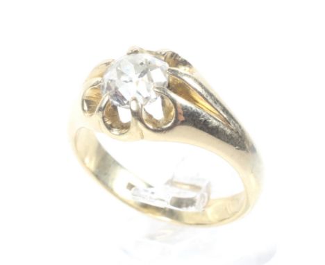 An early 20th century gold and diamond solitaire gypsy ring. The old-cut stone approx. 1.53cts, claw set between tapering sho