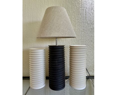 Three Insulator Laverick &amp; Son lamps to include 'The Insulator Lamp Base with shade' 33cm h, 2 x white tall uplight porce