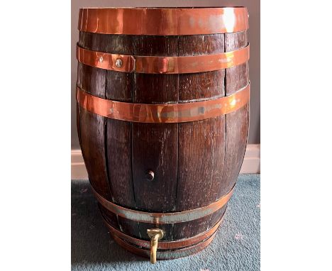 A vintage oak barrel with copper banding. 55cm h x 32cm to top. 