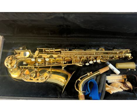 A cased brass saxophone. 