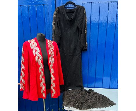 Vintage clothing to include red sequin jacket, 1930’s black dress and Victorian cape. 