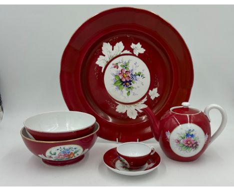 A collection of hand painted Kuznetsov 'Gardner' porcelain to include a large plate 34.5cm d, footed bowl 18cm d, footed bowl