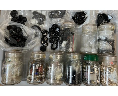 A quantity of vintage loose beads to include jet, glass fastenings etc. 