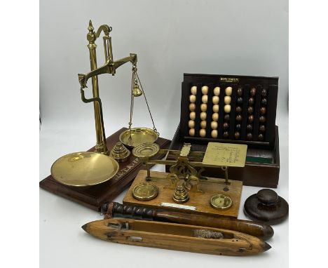 A miscellany to include a set of vintage brass postage scales by S. Mordan &amp; Co., a set of brass and mahogany W. &amp; C.
