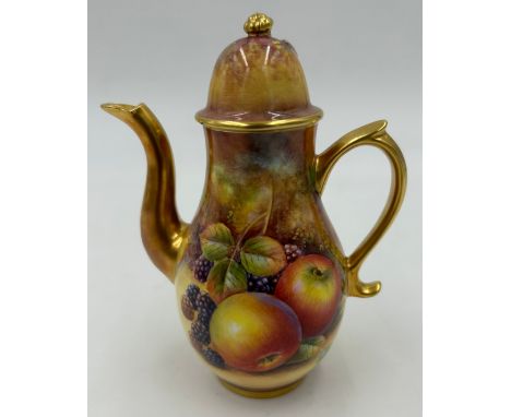 A Royal Worcester miniature coffee pot decorated with apples and berries on a moss background with gilt handle and spout 13cm