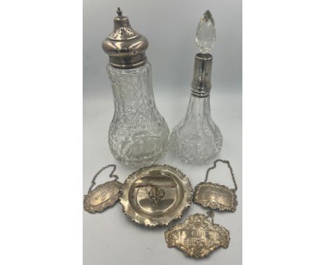 Various silver items to include Gin, Sherry and Whisky decanter labels, an ashtray, silver topped sugar shaker and a silver c