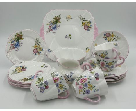 A Shelley 'Wild Flowers' pattern part tea service, comprising  milk jug, sugar bowl, 6 x tea cups, 6 x saucers, 6 x side plat