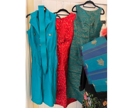 A quantity of vintage costume to include 1960’s evening dresses, feather hat, shawl with gold thread embroidery, KL skirt, Lo