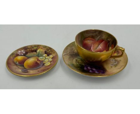 A Royal Worcester miniature cup &amp; saucer decorated with fruit on a moss background and gilt edging, saucer 9.5cm d and cu