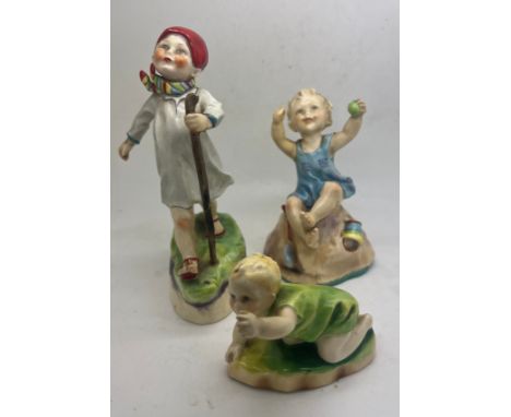 Three Royal Worcester figures, F.G Doughty ‘Michael’, ‘Sunday’s Child’ and ‘Thursday’s Child’. 