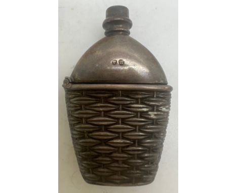 Silver vesta case Birmingham 1887, maker Miller Bros in the form of a hip flask with basket work base. 5cm h. 