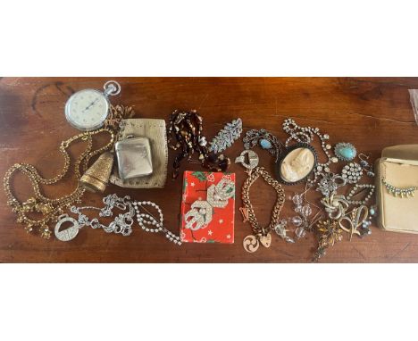 A quantity of vintage costume jewellery to include Art Deco buckle, diamanté necklaces, brooches, stop watch, vesta case etc.