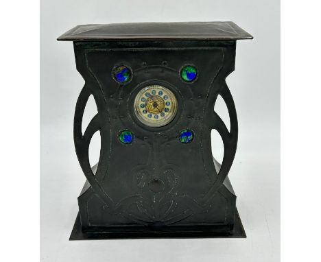 An Arts &amp; Crafts metal mantle clock with enamel decoration manufactured by The British United Clock Co. Ltd. Birmingham. 